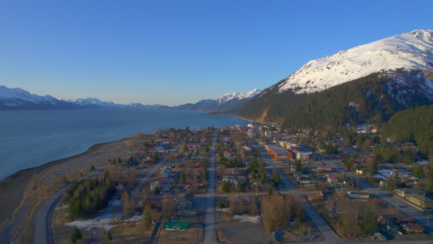 Sunrise aerial view of downtown Seward Alaska. 4k drone.