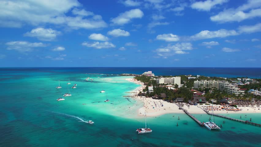 Aerial Drone Flyover Clear Blue Water And Resort In Mexico Playa Norte, Isla Mujeres, 4K