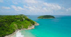 Travel Trip Phuket Thailand. Aerial video sea beach in sunny day The drone is flying over the sea, the view overlooks the coastline and sand, blue water. filmed with a high-quality movie camera.