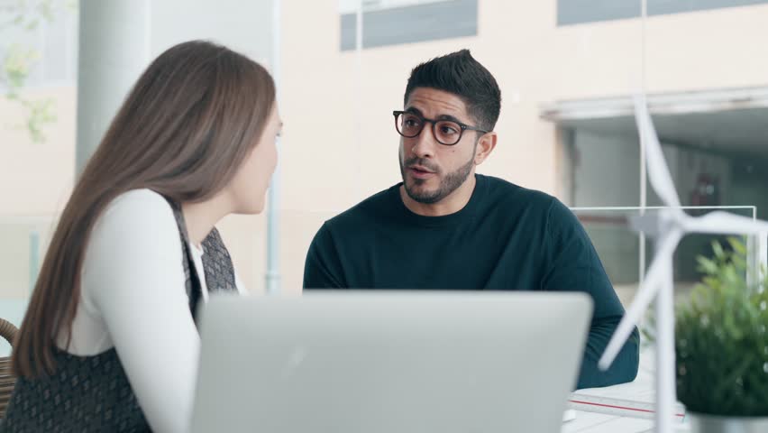 Video of two smart entrepreneurs team talking while working together in a coworking place - Powered by Shutterstock - Get 15% off with code: PIKWIZARD15