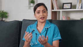 Nurse or doctor from hospital explaining about treatment for disease by looking at camera - concept of Video call, virtual consultation and online medical counselling