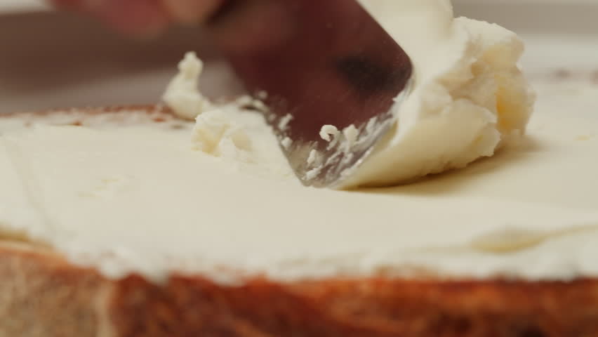 American pastrami sandwich in New York ham meet cuts. chef cooking Famous thick cut sous vide beef sandwich on restaurant cafe kitchen. Bread with curd cheese. Studio shot close up.
