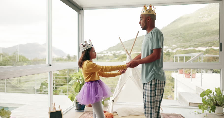 Fantasy, dance and a father with his daughter for fun while playing together as king and princess in their home. Love, family or kids with a man parent and happy female child bonding in a house Royalty-Free Stock Footage #1106913163
