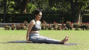 Video footage of a young woman practicing Thunderbolt Pose, Adamantine Pose, and Diamond Yoga Pose in a park.
