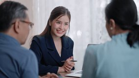 Financial advisor,realtor agent,insurance,lawyer,Manage your retirement fund concept.Financial advisor showing presentation on computer,deal shake hand to happiness Elderly asian couple retirement - Powered by Shutterstock - Get 15% off with code: PIKWIZARD15