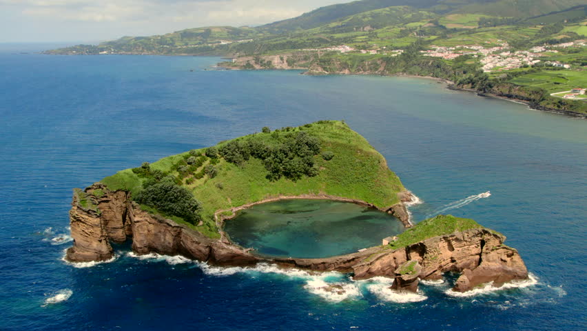 Aerial panoramic view of Azores. Top view of the Island of Vila Franca do Campo. Crater of an old underwater volcano on Sao Miguel, Ponta Delgada Island. Portugal. Tourist attractions, travel concept
 Royalty-Free Stock Footage #1106940753