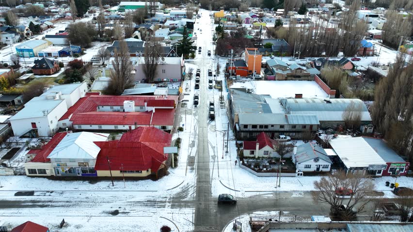 Snowfall At El Calafate In Santa Cruz Argentina. Snowy Landscape. Outdoor Aerial View. Santa Cruz Argentina. Frozen Cityscape. Snowfall At El Calafate In Santa Cruz Argentina.