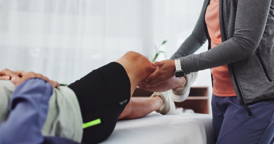 Hands, stretching leg or physiotherapy for a patient to help in physical therapy rehabilitation closeup. Chiropractor, healing or physiotherapist training person in hip muscle exercise or workout | Shutterstock HD Video #1106952129