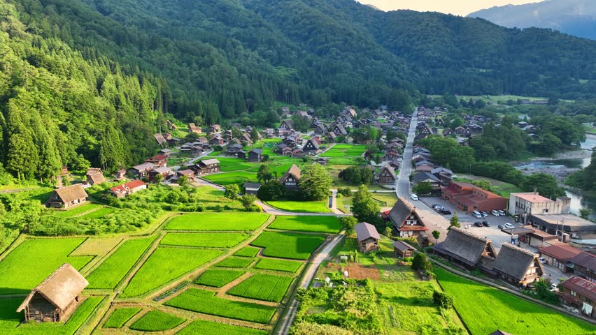 beautiful traditional village of Shirakawago in Japan in summer, unique Japanese village, famous sightseeing spot in the mountains, Japanese culture, UNESCO World Heritage Site. 