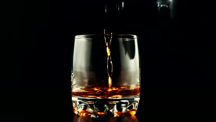 Whiskey And Ice In Glass. Bartender Mixes Cognac With Cola.Barman Make Cocktail With Whisky And Cola. Ice Cubes And Bourbon In Glass In Slow Motion. Gold Marble Alcohol Drink Rotating. Rum From Bottle
