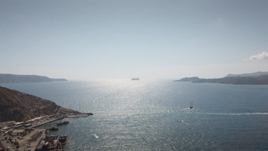 Famous port of Athinios in volcanic island of Santorini, Cyclades, Greece