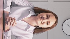 Vertical video. Female leadership. Business coaching. Cheerful confident woman speaker giving instructions professional seminar at office. - Powered by Shutterstock - Get 15% off with code: PIKWIZARD15