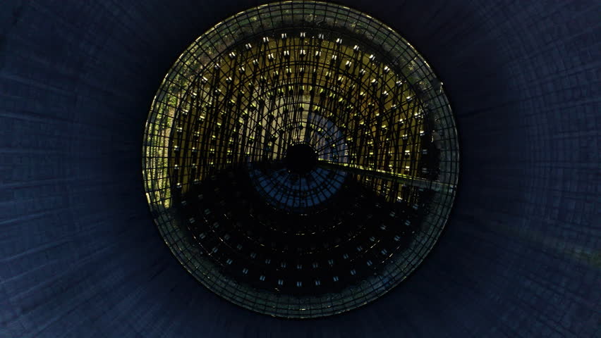 4K aerial drone footage of a large coal fired power station with cooling towers, chimney and boiler house. Nuclear power plant. Abandoned coal power plant. Aerial vertical, vertical video background.