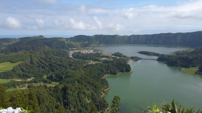 View of Lagoa das Sete Cidades and Lagoa Azul fron Miradouro da Vista do Rei in the San Miguel, Azores Island, Portugal on a sunny summer day