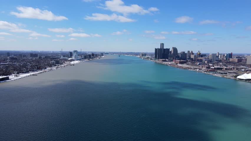Detroit River - Downtown Detroit in Michigan USA on the right, Windsor Canada on the left.