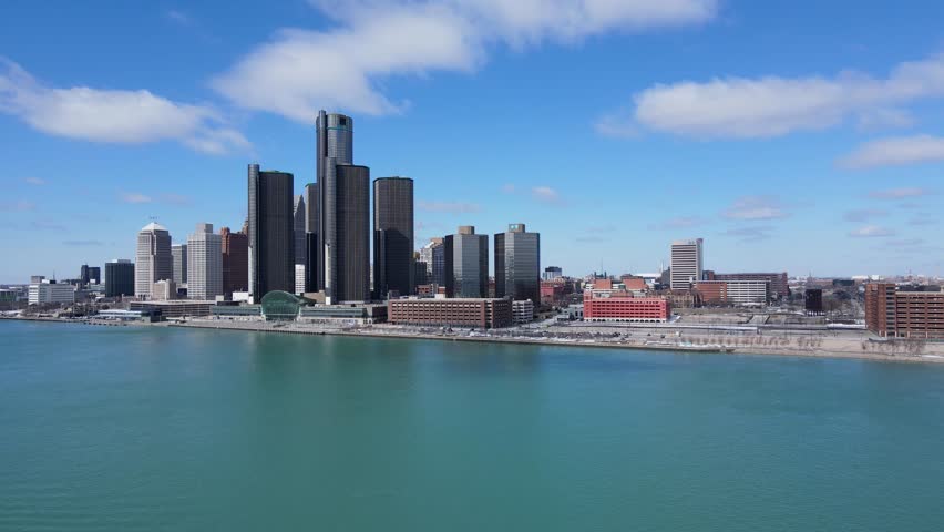 Downtown Detroit with the Renaissance Center in winter, aerial ascend view