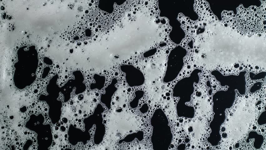 Soap foam moving in black background, natural shampoo white bubbles motion, slow motion, 8K downscale, 4K. Royalty-Free Stock Footage #1106987325