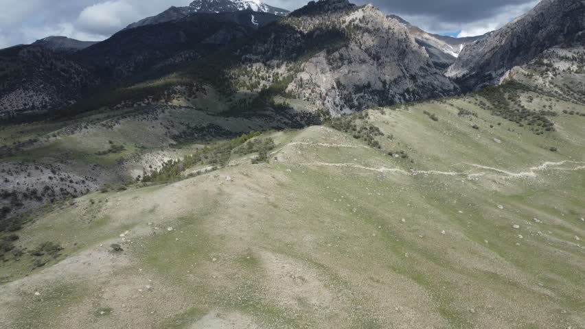 Borah Peak, Idaho State High Point, Tallest Mountain - Aerial Drone View Reverse, Backwards