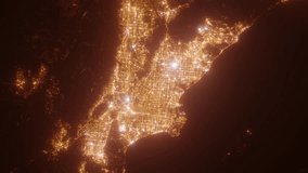 Los Angeles (California, USA) aerial view at night. Top view on modern city with street lights. Camera is zooming out, rotating clockwise. Vertical video. The north is on the left side