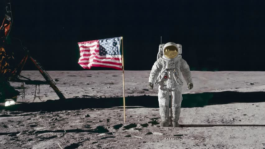 Astronaut saluting the American flag. 3d rendring. Some Elements of this video furnished by NASA. Royalty-Free Stock Footage #1107008379