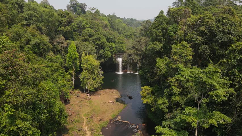Aerial drone footage: Flying forward to Tad Champee Waterfall, Pakse Laos, 4k Royalty-Free Stock Footage #1107010333