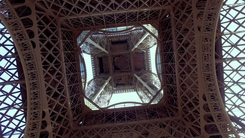 Eiffel Tower panoramic video from center up tp the tower top Royalty-Free Stock Footage #1107010497