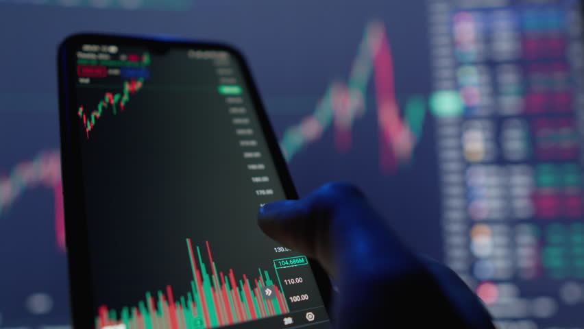 Thanks to access to charts and charts of the financial market on a mobile device, the investor has opportunity to monitor changes in stock prices in real time and make appropriate decisions. Close-up Royalty-Free Stock Footage #1107011271