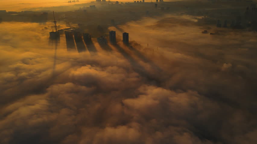  Fog and haze over the city, among the skyscrapers in Russia