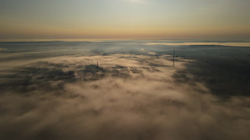  Fog and haze over the city, among the skyscrapers in Russia