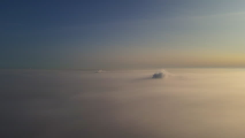  Fog and haze over the city, among the skyscrapers in Russia