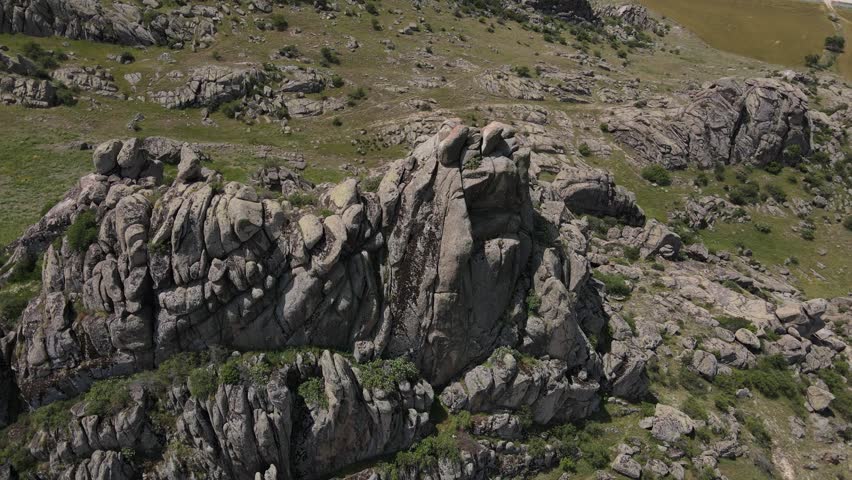 Aerial drone footage: drone turning around the high granite cliff, Eskişehir, Karakayalar, Turkey, Türkiye, 4k