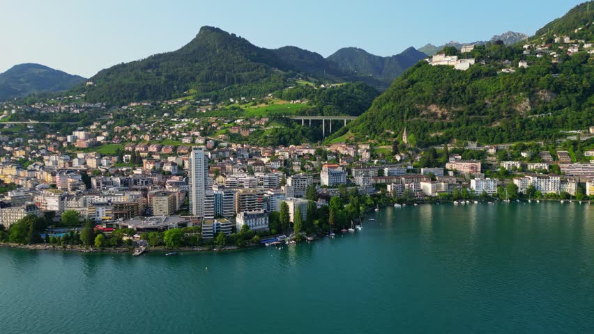 Aerial view of Montreux, Switzerland. Flying over Lake Geneva, view to Montreux city center and green hills