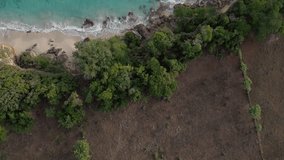 Untouched nature of Playa Chencho beach in Dominican Republic. Aerial top-down view
