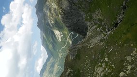 Aerial Cinematic View Of Grimsel Pass In The Alps In Switzerland. Vertical Shot, Push Forward With Tilt Down Show
