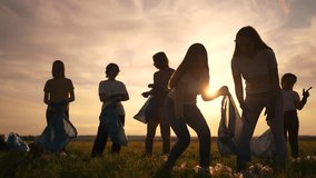 group silhouette volunteers clean up trash. environmental protection ecology cleaning from world garbage plastic concept. group nature people volunteers collects plastic bottles garbage bags - Powered by Shutterstock - Get 15% off with code: PIKWIZARD15