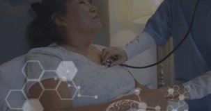 Animation of globe and data processing over asian female doctor and female patient. Global healthcare, science, medicine, research, computing and data processing concept digitally generated video.