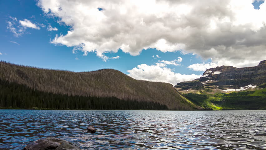 Cameron Lake timelapse with Mount Custer and Forum peak. Cameron Lake is a sub-alpine lake in Waterton Lakes National Park, Alberta, Canada