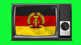 Waving flag of East Germany on the screen of an old TV set, isolated in chroma key background. 3d animation in 4k resolution video.