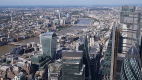 Close Aerial view of the City of London Towers, River Thames with the Shard and Tower Bridge. London, UK. - Powered by Shutterstock - Get 15% off with code: PIKWIZARD15