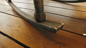 Lower part of old rocking chair swinging - Powered by Shutterstock - Get 15% off with code: PIKWIZARD15