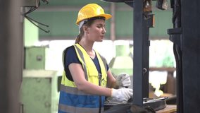 caucasian Industry engineer worker woman wearing safety uniform and hard hat control stick of truck crane or forklift In Industrial Factory warehouse . - Powered by Shutterstock - Get 15% off with code: PIKWIZARD15