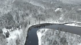 flight over winter forest and river