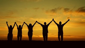 Group of business people outdoors raise their hands to sky. Team of people look at their future together at sunset, park. Human resources. Community of people joint prayer. Unity of group of people - Powered by Shutterstock - Get 15% off with code: PIKWIZARD15