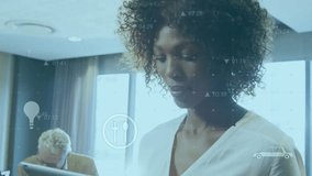 Animation of data processing against african american woman while using digital tablet at office. Computer interface and business data technology concept - Powered by Shutterstock - Get 15% off with code: PIKWIZARD15