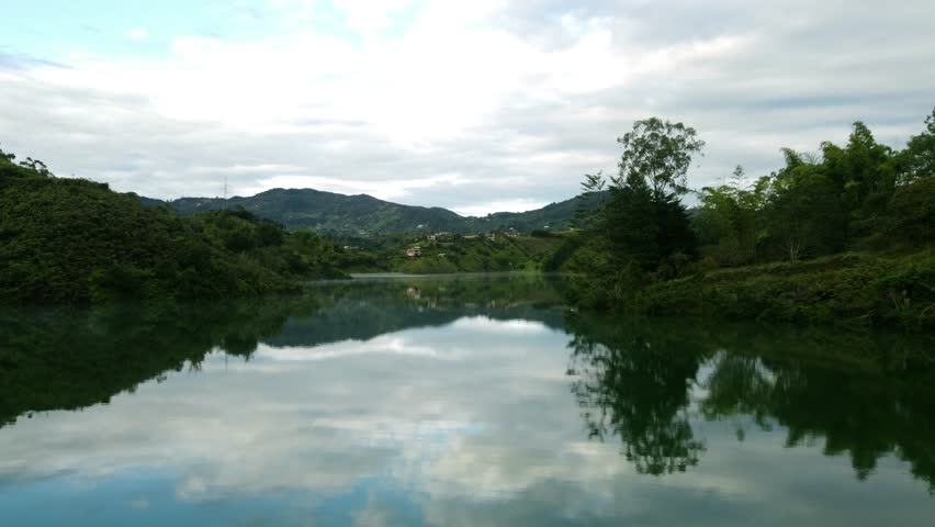 A foggy morning on the Guatape Lakes in Guatape, Colombia
