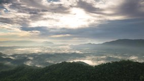 Hyperlapse Video (4K), Beautiful aerial view of a mountain with the sun shining golden, Baan Pang Puai, Mae Moh, Lampang, Thailand.