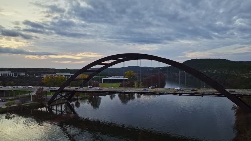 Side view of Pennybacker Bridge over Lake Austin in Austin, TX.