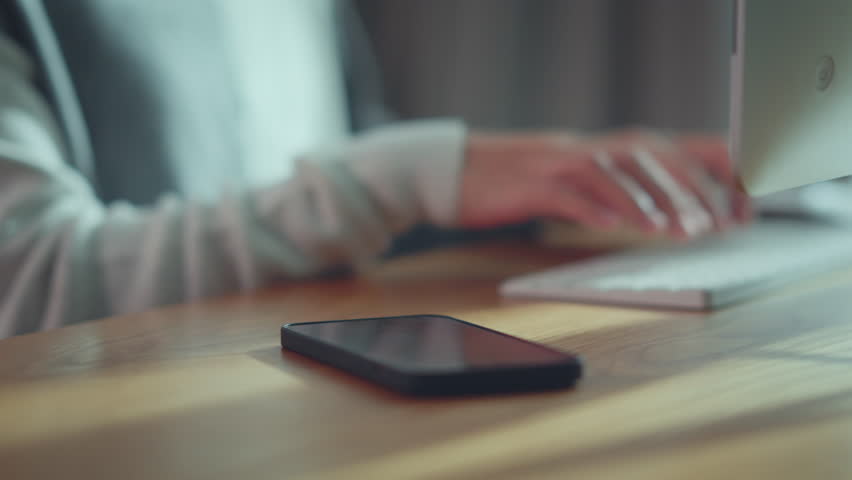 Smart phone mobile receiving mail message, email notification, Woman employee use mobile phone after receiving an email message while sitting at work desk. Royalty-Free Stock Footage #1107120641