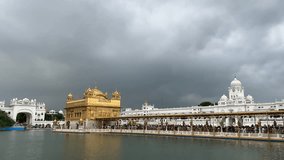 the beautiful golden temple and its reflection in amritsar, india
