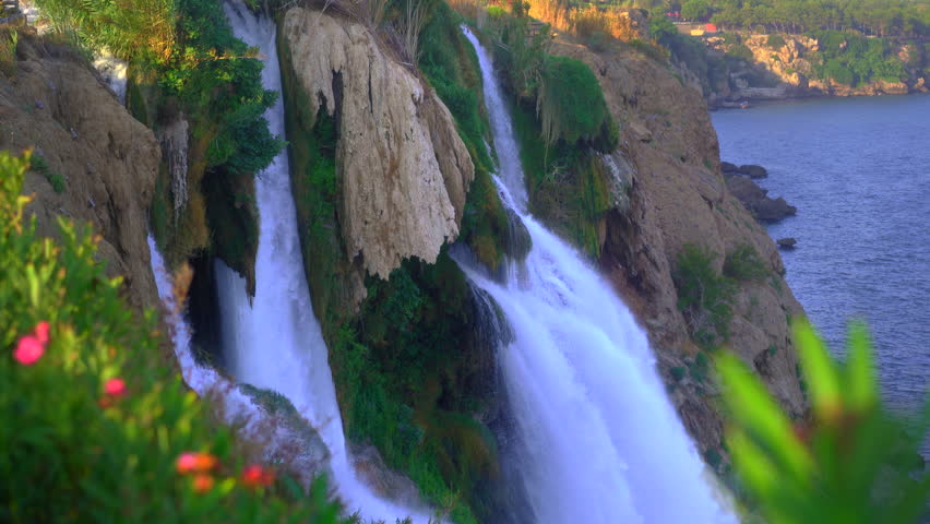 Hanheld shot. View on the lower Duden waterfalls in the city of Antalya
